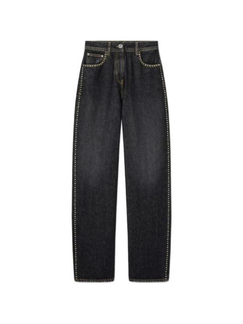 VERSACE studded denim trousers