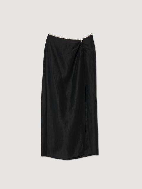 Skirt with a slit and rhinestones