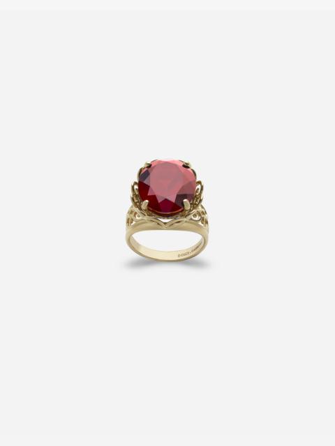 Gold ring with precious stone