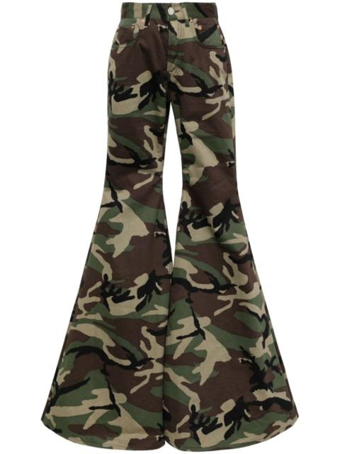 VETEMENTS camouflage-print flared trousers