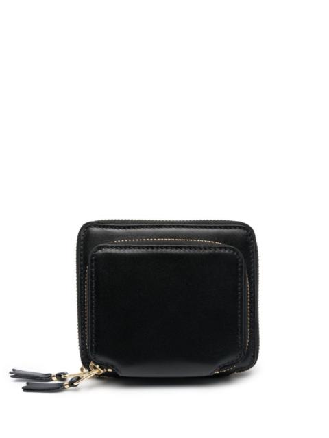 Comme Des Garçons zipped leather wallet