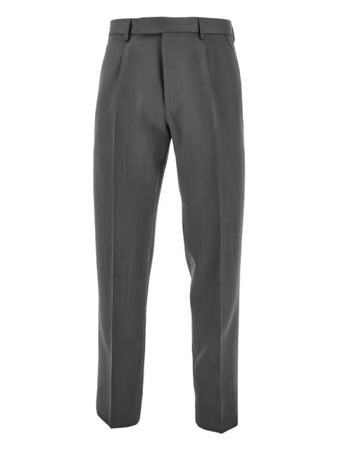 pleated-front tailored trousers