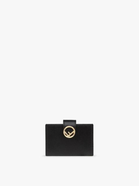 Flat F is Fendi card holder with central compartment and five credit card slots. Made of black leath