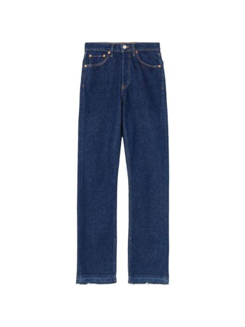 slim cut mid-rise jeans