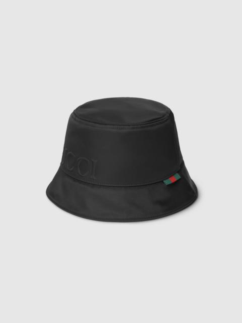 Nylon bucket hat with Gucci logo