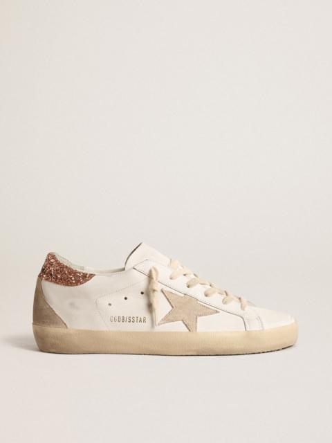 Golden Goose Super-Star with a suede star and peach-pink glitter heel tab