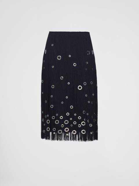 Midi-skirt with fringe and grommet embellishment