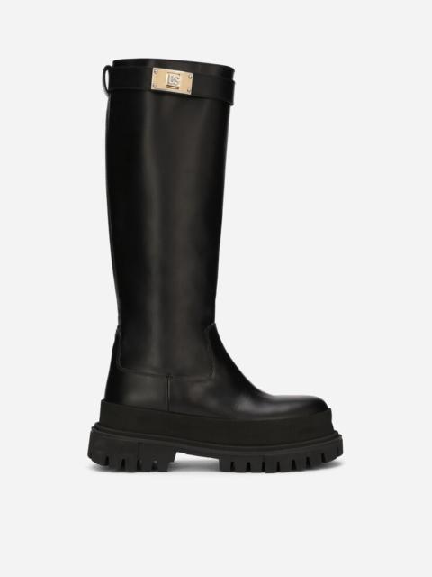 Calfskin boots with branded strap