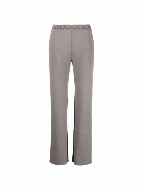 Arrow-waistband trousers
