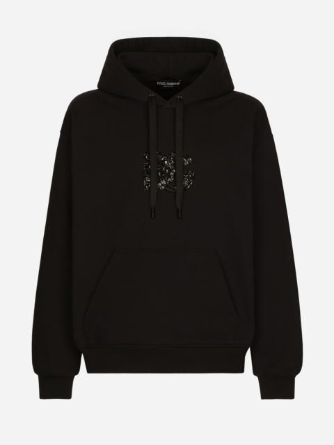 Hoodie with rhinestone-detailed DG patch