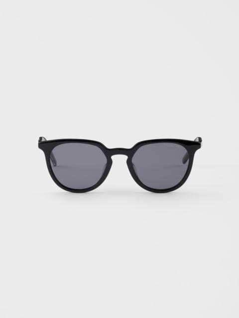 Prada Prada sunglasses with the iconic metal plaque