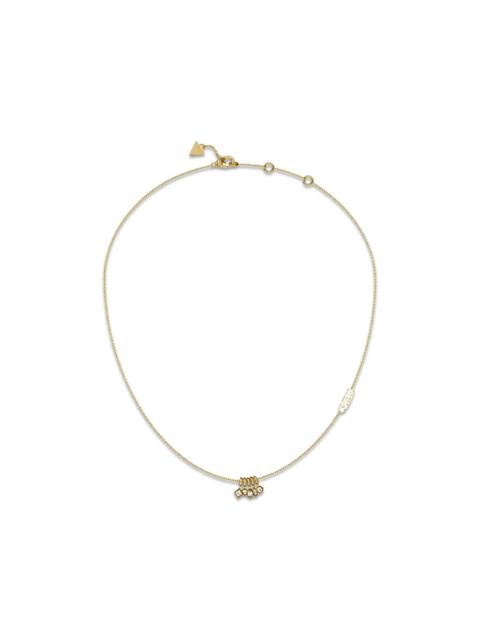 GUESS USA multi-charm necklace