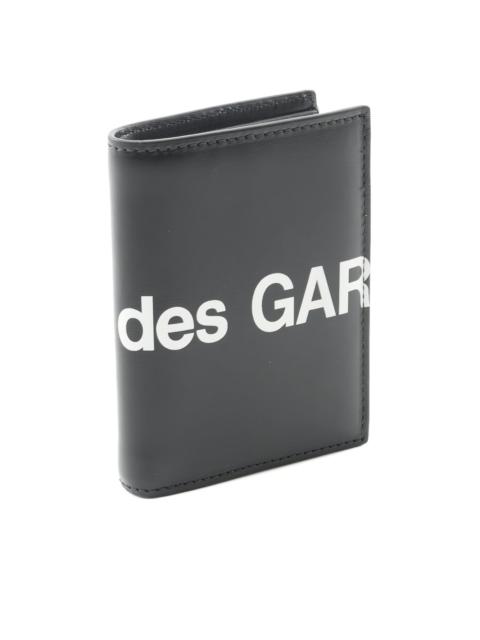 Comme Des Garçons logo-print bi-fold leather wallet