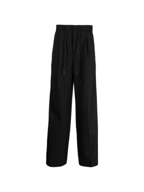 Holzweiler pressed-crease tailored trousers