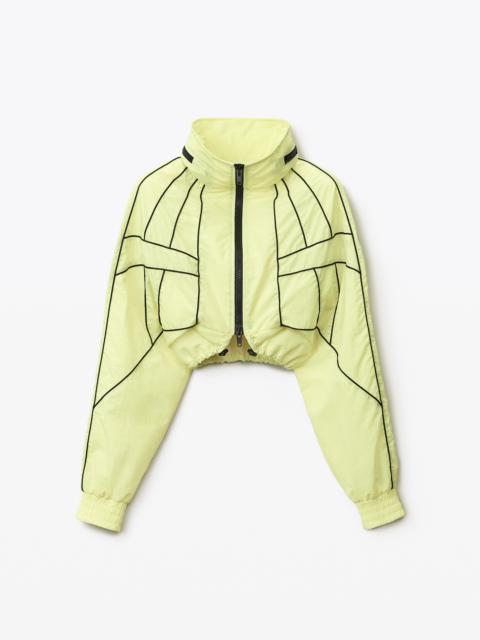 Alexander Wang SCULPTED PIPING TRACK SHRUG IN NYLON