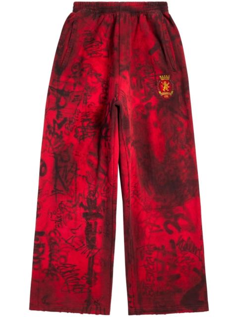 BALENCIAGA Graffiti Crest cotton track pants