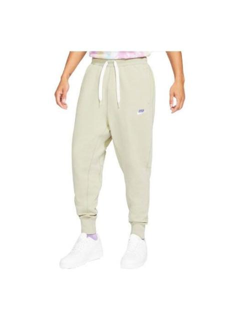 Nike Nike Sportswear Embroidered Logo Solid Color Bundle Feet Sports Pants Beige Creamy DA0019-230