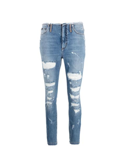 distressed-finish skinny-cut jeans