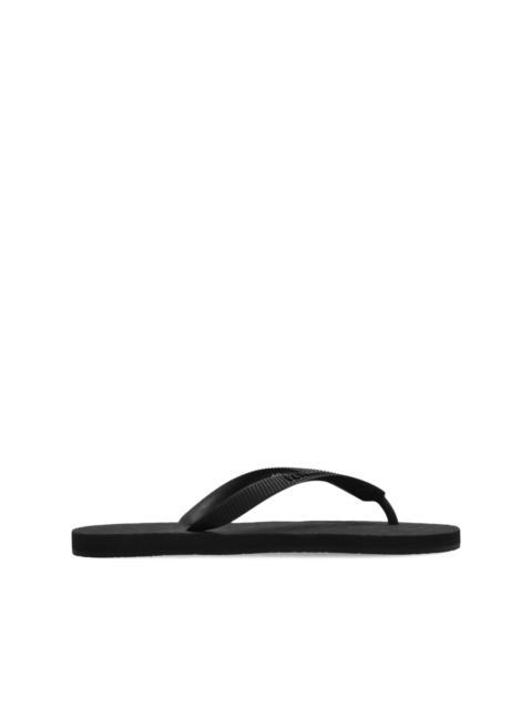 VETEMENTS embossed logo flip flops
