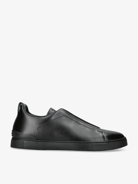 Triple Stitch leather low-top trainers