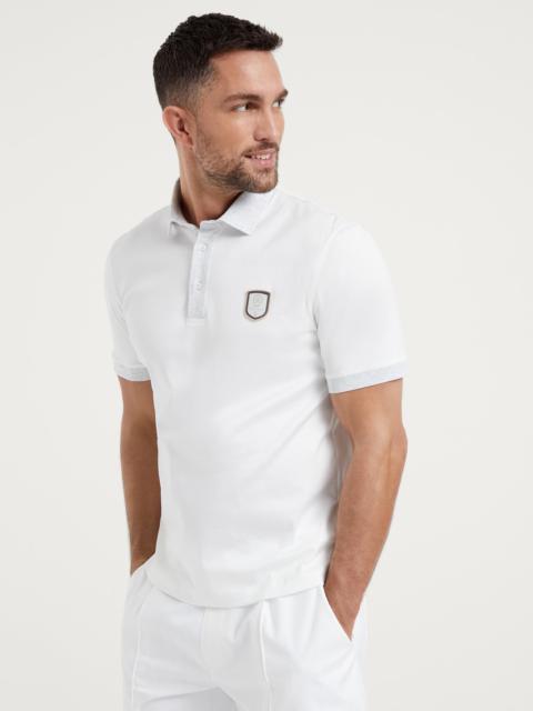 Cotton jersey polo with contrast details and tennis badge