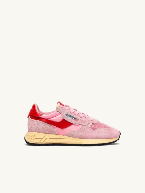 AUTRY REELWIND LOW SNEAKERS IN PINK CHERUB AND FLAME SCARLET NYLON AND SUEDE