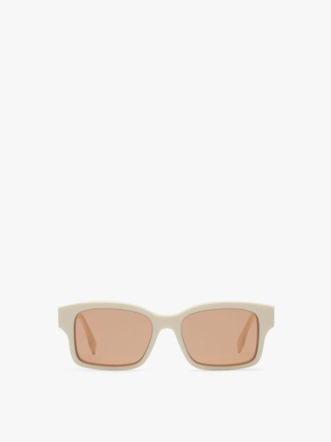 FENDI Rectangular, white acetate O’Lock glasses. Temples with gold metal oversized O’Lock logo and brown l