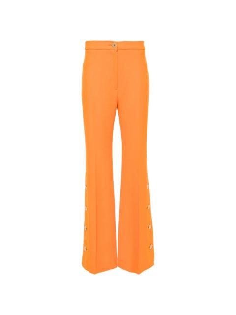side-buttoned tapered trousers