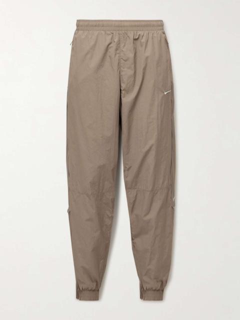 Nike Solo Swoosh Tapered Logo-Embroidered Nylon Track Pants