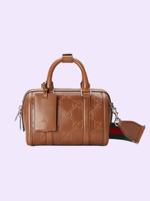 GUCCI GG embossed mini duffle bag