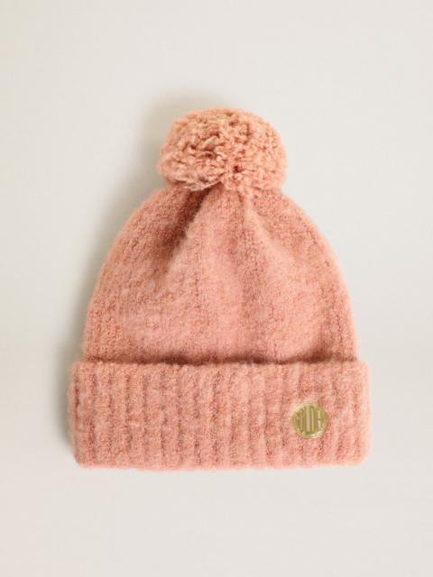 Pale pink wool beanie with pompom