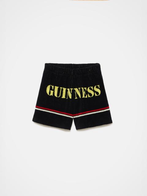 JW Anderson Unisex JW ANDERSON X GUINNESS TOWELLING SHORTS IN BLACK