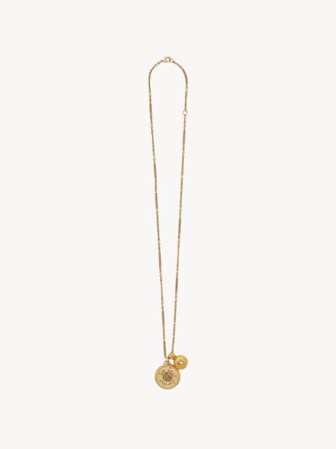 SAINT LAURENT CASSANDRE MEDALLION NECKLACE IN METAL