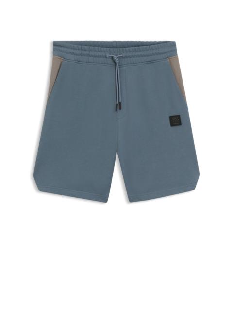 HUGO HUGO X RB COTTON-TERRY SHORTS WITH BULL MOTIF