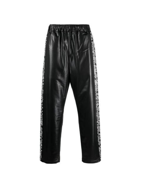 Keith Haring tape-detailing track pants