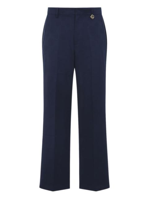 CASABLANCA monogram-pattern charm-detail trousers