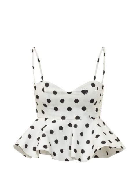 FIORUCCI polka-dot peplum top