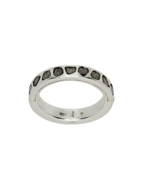 Parts of Four Silver Sistema Ring