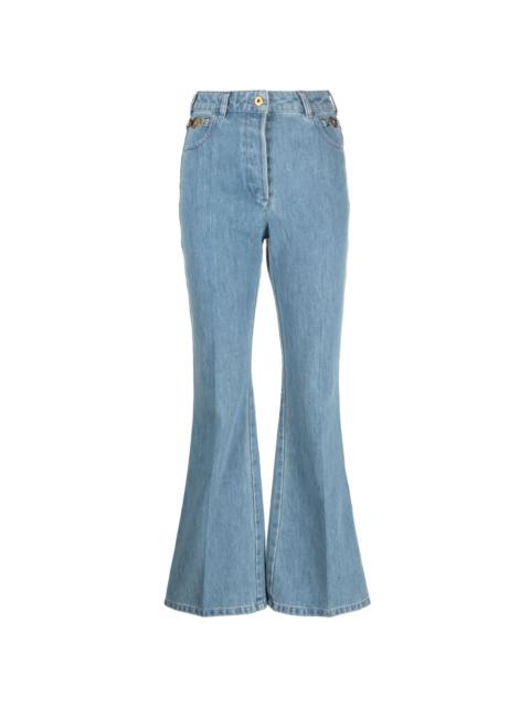 PATOU logo-embroidered flared jeans