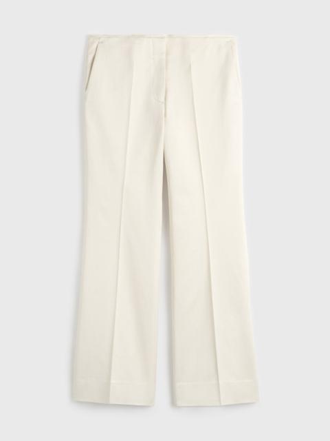 TOTEME Kick flare raw-edge trousers stone
