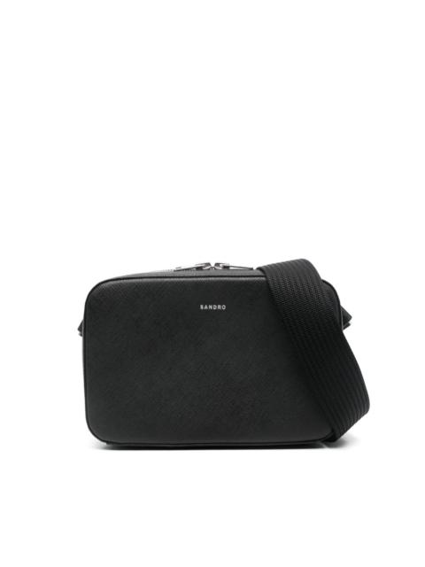 Sandro logo-debossed messenger bag