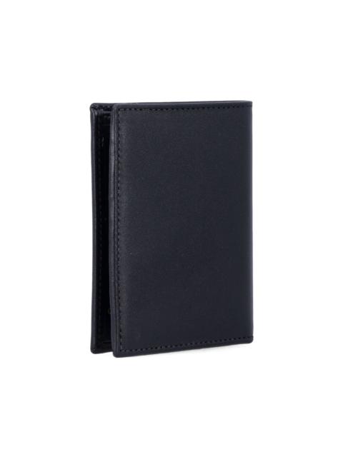 Comme Des Garçons leather bifold wallet