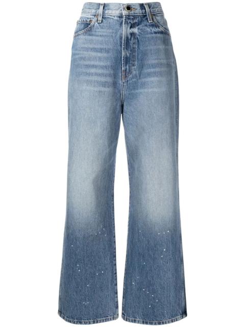 KHAITE paint-splatter wide-leg jeans