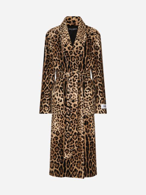 Leopard-print terrycloth coat with belt and the Re-Edition label
