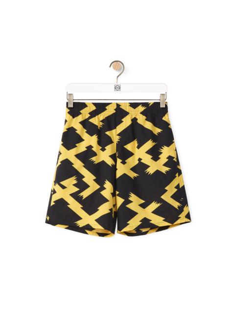 Loewe Allover print shorts in cotton