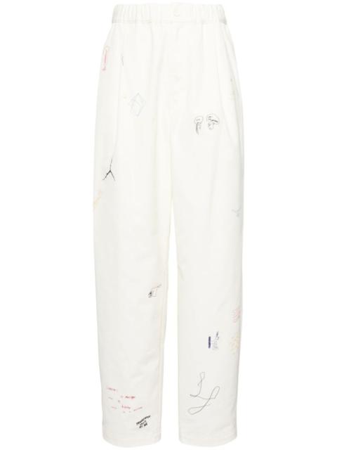UNDERCOVER sketch-style printed trousers