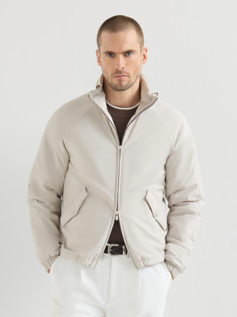 Lightweight nylon outerwear jacket with packable hood
