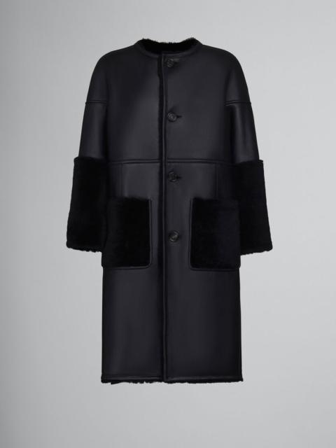 BLACK REVERSIBLE SHEARLING COAT