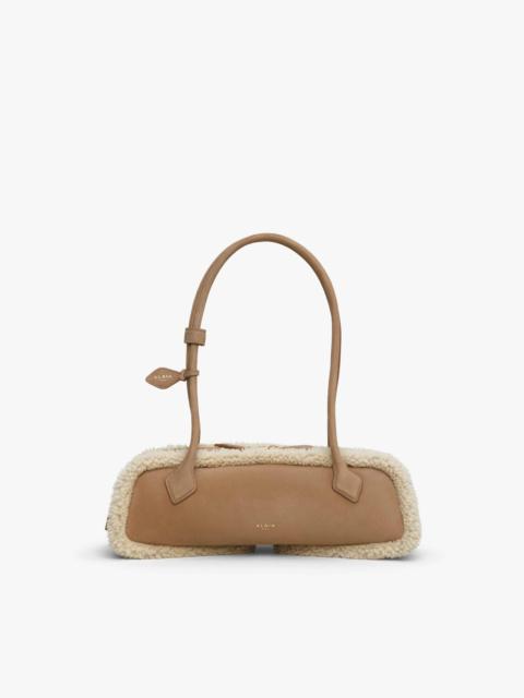Alaïa LE TECKEL MEDIUM BAG IN MERINO SHEARLING
