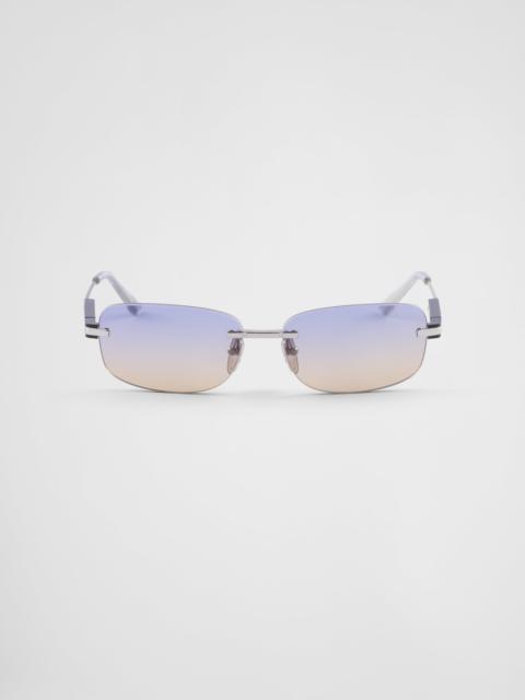 Prada Sunglasses with iconic metal plaque